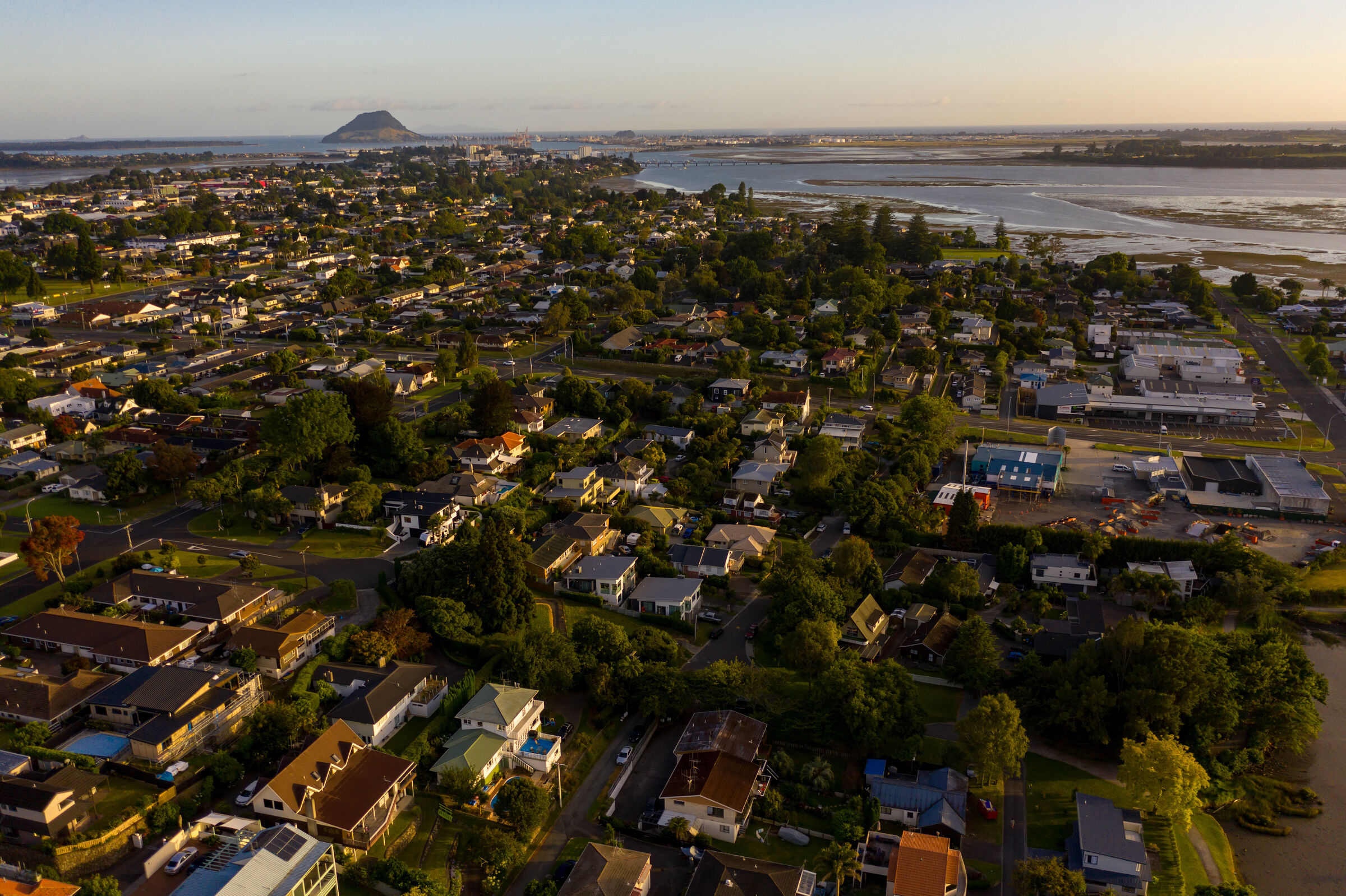 Sunrise over neighborhood with Mt Maunganui in Distance