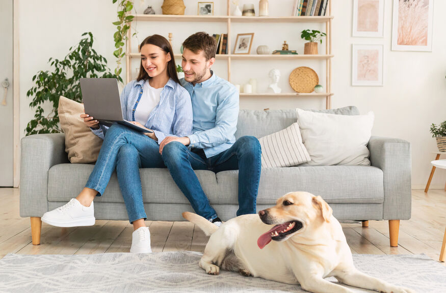 Young couple sitting on couch